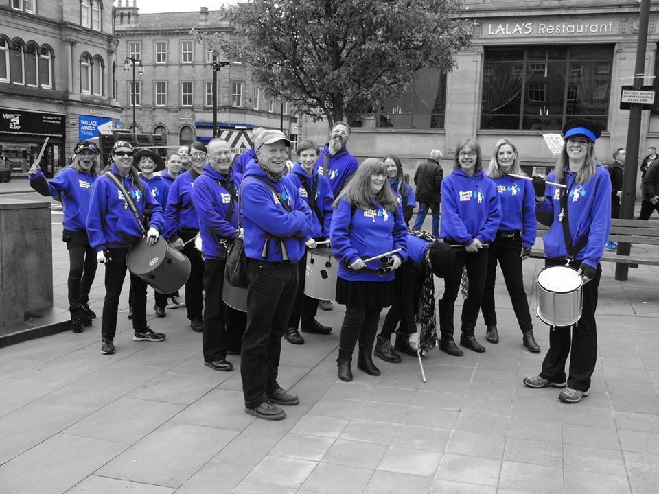 Honley Samba Band all in blue at St George's Square Huddersfield (now Banda Na Rua)