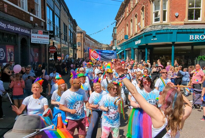 Banda Na Rua Samba Band at York Pride wearing Bisexual Flag Colours